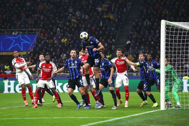 MILAN, ITALY - NOVEMBER 06: Mehdi Taremi of FC Internazionale headers the ball clear during the UEFA Champions League 2024/25 League Phase MD4 match between FC Internazionale Milano and Arsenal FC at Stadio San Siro on November 06, 2024 in Milan, Italy. (Photo by Marco Luzzani/Getty Images)