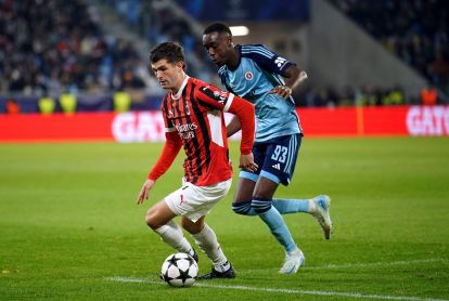 Christian Pulisic of AC Milan controls the ball whilst under pressure from Idjessi Metsoko of SK Slovan Bratislava during the UEFA Champions League 2024/25 League Phase MD5 match between SK Slovan Bratislava and AC Milan at Narodny Futbalovy Stadion on November 26, 2024 in Bratislava, Slovakia. (Photo by Christian Hofer/Getty Images)