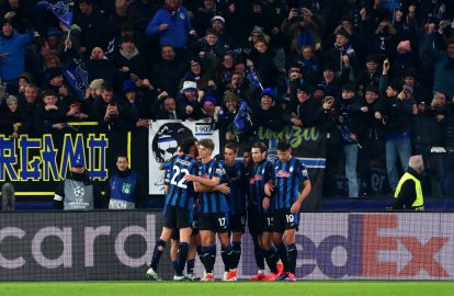 BERGAMO, ITALY - DECEMBER 10: Charles De Ketelaere of Atalanta celebrates with teammates after scoring his team's first goal from the penalty spot during the UEFA Champions League 2024/25 League Phase MD6 match between Atalanta BC and Real Madrid C.F. at Stadio di Bergamo on December 10, 2024 in Bergamo, Italy. (Photo by Marco Luzzani/Getty Images)