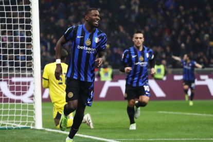 MILAN, ITALY - DECEMBER 06: Marcus Thuram of FC Internazionale celebrates scoring his team's third goal during the Serie A match between FC Internazionale and Parma at Stadio Giuseppe Meazza on December 06, 2024 in Milan, Italy. (Photo by Marco Luzzani/Getty Images)