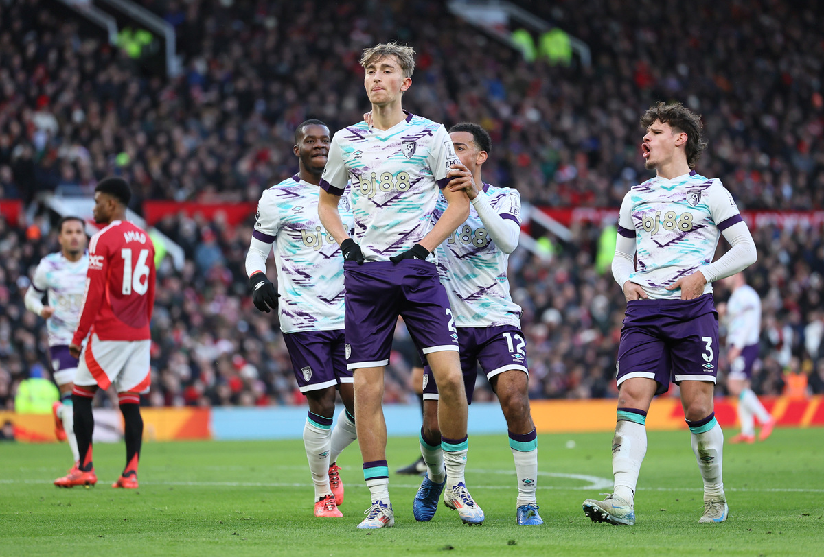 Dean Huijsen of AFC Bournemouth celebrates scoring his team's first goal during the Premier League match between Manchester United FC and AFC Bournemouth at Old Trafford on December 22, 2024 in Manchester, England. (Photo by Matt McNulty/Getty Images)