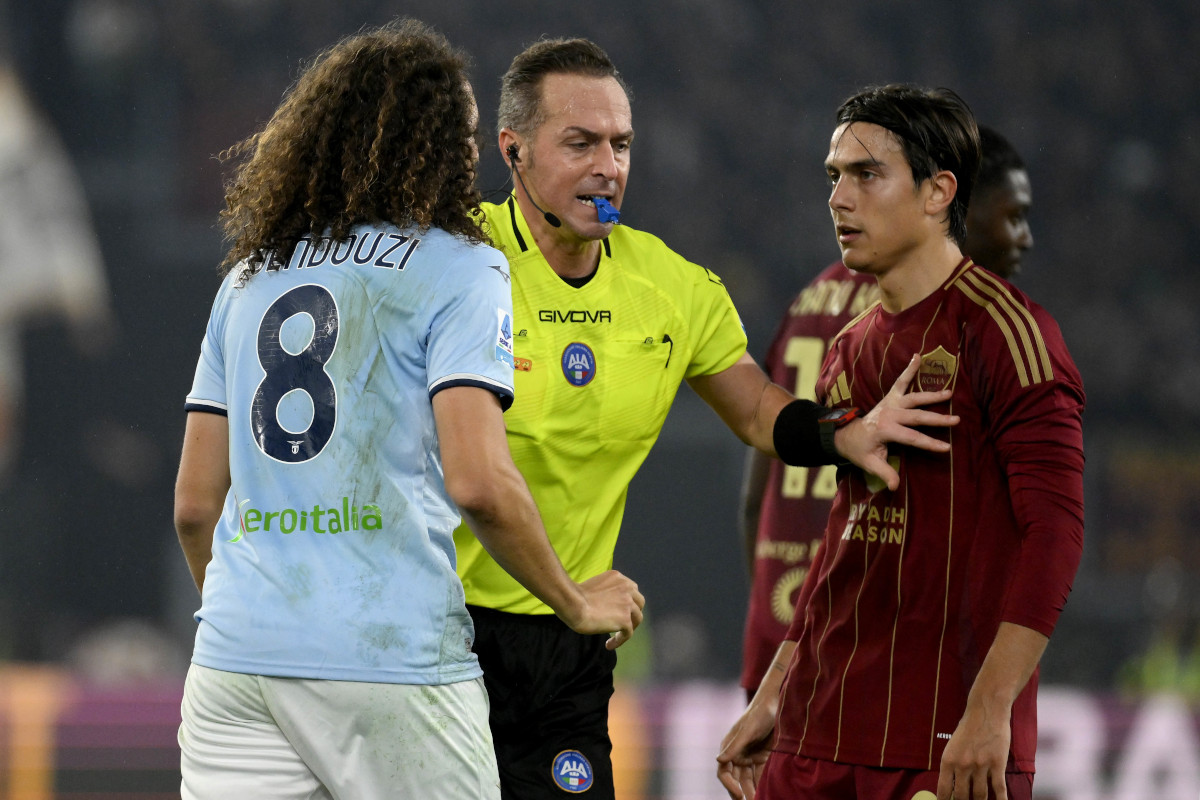 ROME, ITALY - JANUARY 05: Matteo Guendouzi of SS Lazio and Paulo Dybala of AS Roma reacts during the Serie match between Roma and Lazio at Stadio Olimpico on January 05, 2025 in Rome, Italy. (Photo by Marco Rosi - SS Lazio/Getty Images)