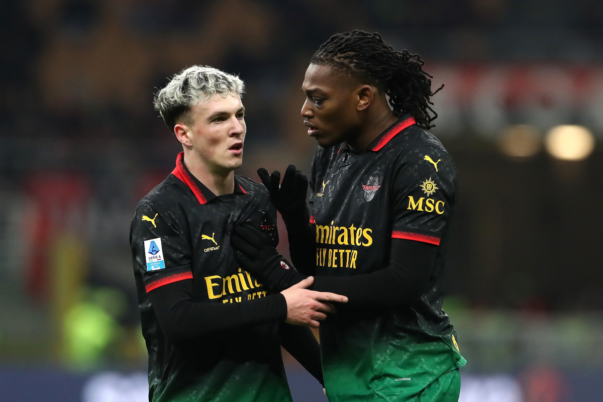 MILAN, ITALY - FEBRUARY 15: Rafael Leao and Alex Jimenez of AC Milan are pictured talking during the Serie A match between AC Milan and Verona at Stadio Giuseppe Meazza on February 15, 2025 in Milan, Italy. (Photo by Marco Luzzani/Getty Images)