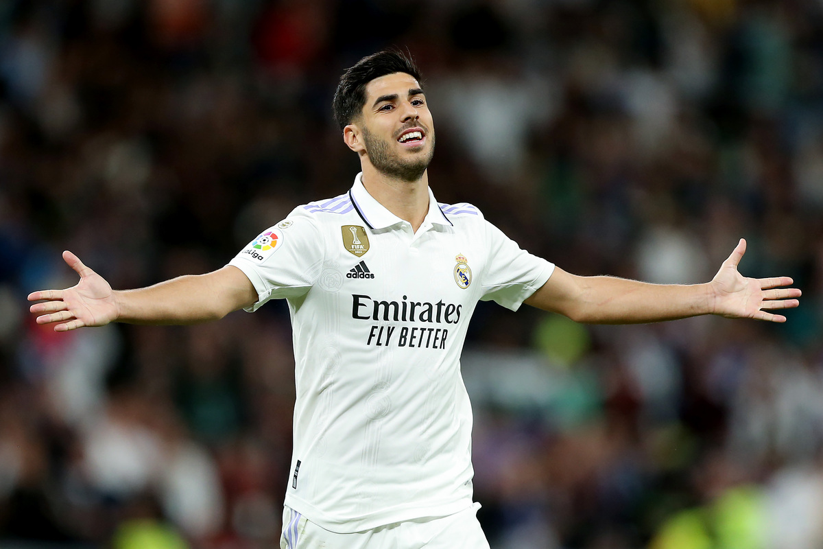 MADRID, SPAIN - MAY 13: Marco Asensio of Real Madrid celebrates after scoring the team's first goal during the LaLiga Santander match between Real Madrid CF and Getafe CF at Estadio Santiago Bernabeu on May 13, 2023 in Madrid, Spain. (Photo by Florencia Tan Jun/Getty Images)