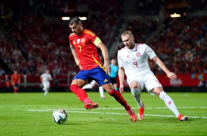 MURCIA, SPAIN - OCTOBER 12: Alvaro Morata of Spain is challenged by Victor Nelsson of Denmark during the UEFA Nations League 2024/25 League A Group A4 match between Spain and Denmark at Nueva Condomina on October 12, 2024 in Murcia, Spain. (Photo by Mateo Villalba Sanchez/Getty Images)