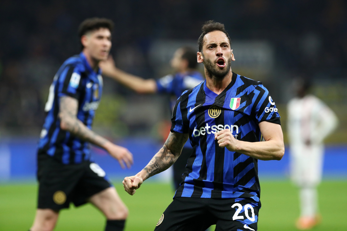 MILAN, ITALY - MARCH 08: Hakan Calhanoglu of FC Internazionale celebrates scoring his team's second goal during the Serie A match between FC Internazionale and Monza at Stadio Giuseppe Meazza on March 08, 2025 in Milan, Italy. (Photo by Marco Luzzani/Getty Images)