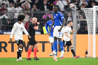 DORTMUND, GERMANY - MARCH 23: Moise Kean of Italy celebrates scoring his team's second goal during the UEFA Nations League Quarterfinal Leg Two match between Germany and Italy at Football Stadium Dortmund on March 23, 2025 in Dortmund, Germany. (Photo by Stuart Franklin/Getty Images)