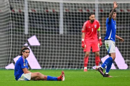 MILAN, ITALY - MARCH 20: Riccardo Calafiori of Italy reacts during the UEFA Nations League quarterfinal leg one match between Italy and Germany at Stadio San Siro on March 20, 2025 in Milan, Italy. (Photo by Alessandro Sabattini/Getty Images)