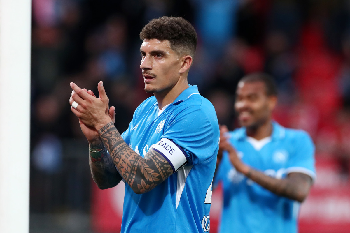MONZA, ITALY - APRIL 19: Giovanni Di Lorenzo of Napoli shows appreciation to the fans following 1-0 victory after the Serie A match between Monza and Napoli at U-Power Stadium on April 19, 2025 in Monza, Italy. (Photo by Marco Luzzani/Getty Images)