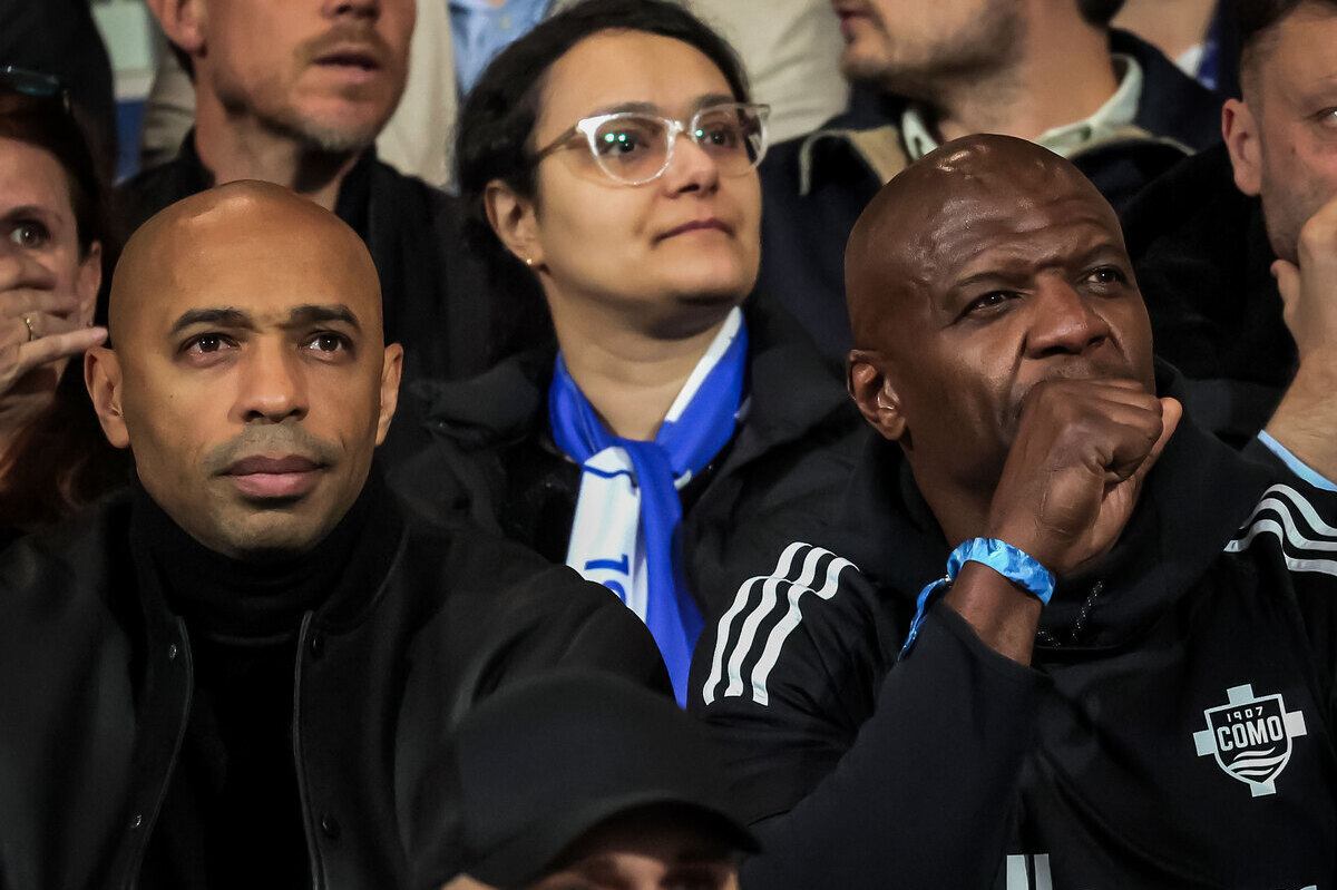 Thierry Henry and actor Terry Crews at the Stadio Sinigaglia watching the Serie A match between Como and Torino.