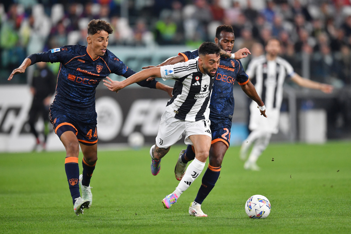 TURIN, ITALY - APRIL 12: Nicolas Gonzalez of Juventus is challenged by Tiago Coelho Oliveira and Lassana Coulibaly of US Lecce during the Serie A match between Juventus and Lecce at Allianz Stadium on April 12, 2025 in Turin, Italy. (Photo by Valerio Pennicino/Getty Images)