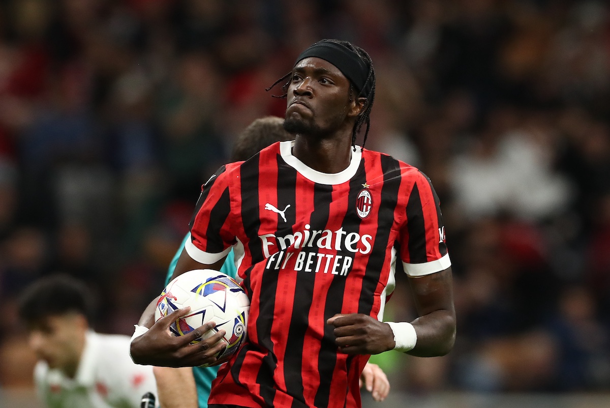 MILAN, ITALY - APRIL 05: Tammy Abraham of AC Milan celebrates scoring his team's first goal during the Serie A match between AC Milan and Fiorentina at Stadio Giuseppe Meazza on April 05, 2025 in Milan, Italy. (Photo by Marco Luzzani/Getty Images)