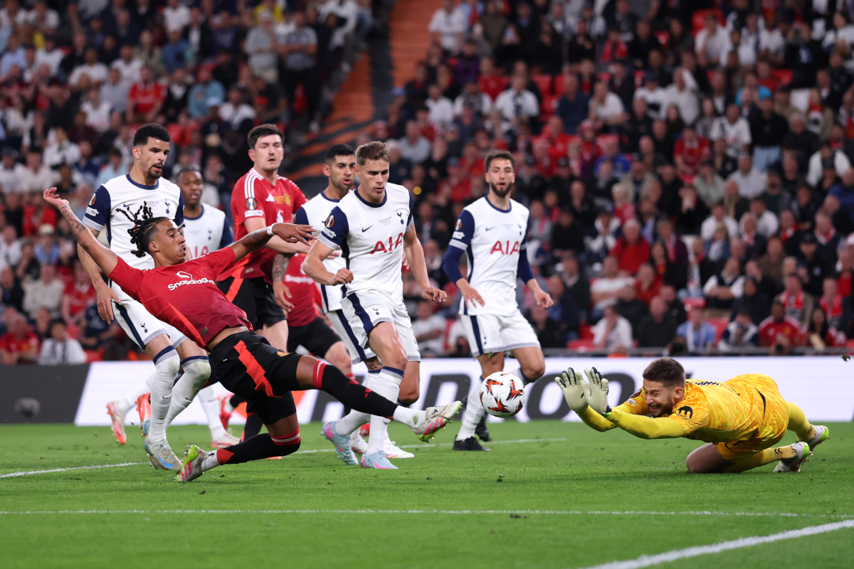 How to buy Premier League tickets for Tottenham vs. Man Utd BILBAO, SPAIN - MAY 21: Leny Yoro of Manchester United stretches to meet a crossed ball with Guglielmo Vicario of Tottenham Hotspur during the UEFA Europa League Final 2025 between Tottenham Hotspur and Manchester United at Estadio de San Mames on May 21, 2025 in Bilbao, Spain. (Photo by Ryan Pierse/Getty Images)