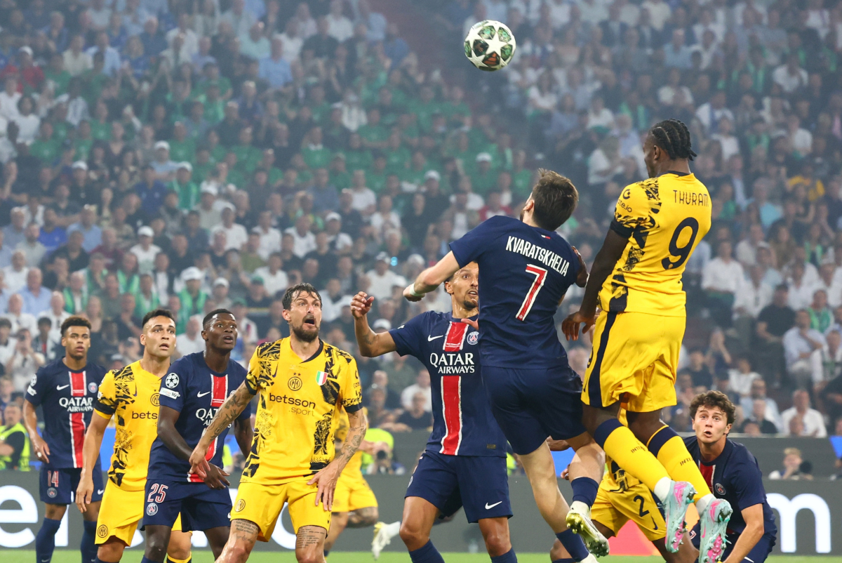 epa12147957 Khvicha Kvaratskhelia (2-R) of PSG and Marcus Thuram (R) of Inter in action during the UEFA Champions League final between Paris Saint-Germain and Internazionale Milano, in Munich, Germany, 31 May 2025. EPA-EFE/ANNA SZILAGYI