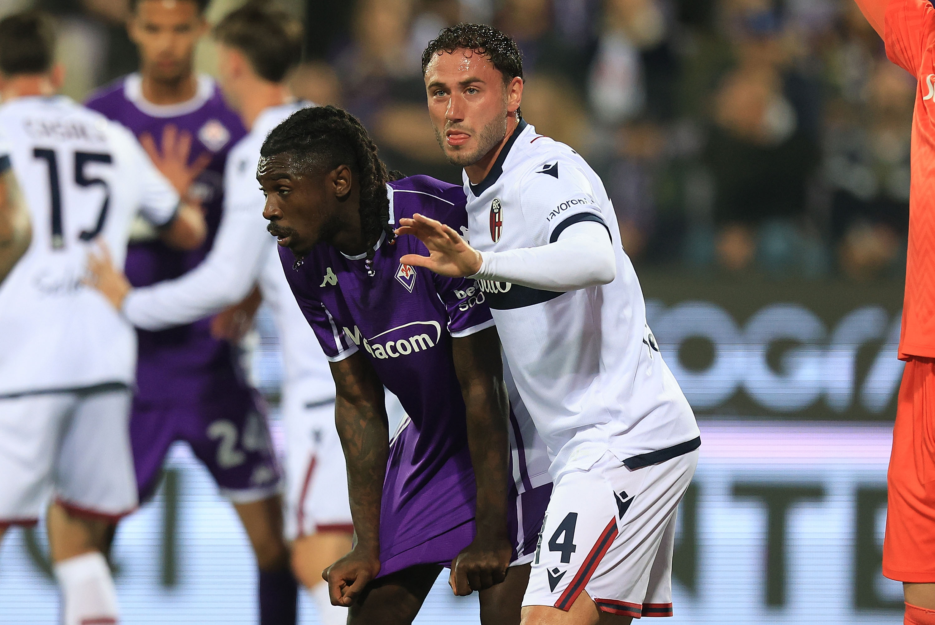 FLORENCE, ITALY - MAY 18: Moise Kean of ACF Fiorentina and Davide Calabria of Bologna FC 1909 looks on during the Serie A match between Fiorentina and Bologna at Stadio Artemio Franchi on May 18, 2025 in Florence, Italy. (Photo by Gabriele Maltinti/Getty Images)