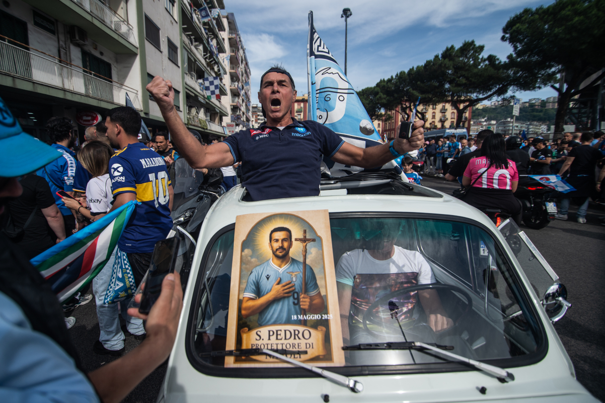 Naples, Italy - May 23: SSC Napoli supporters in a car with the image of Pedro of SS Lazio celebrate Scudetto's victory ahead of the match between Napoli and Cagliari at the Stadio Diego Armando Maradona in Naples, Italy on May 23, 2025. (Photo: Ivan Romano/Getty Images)