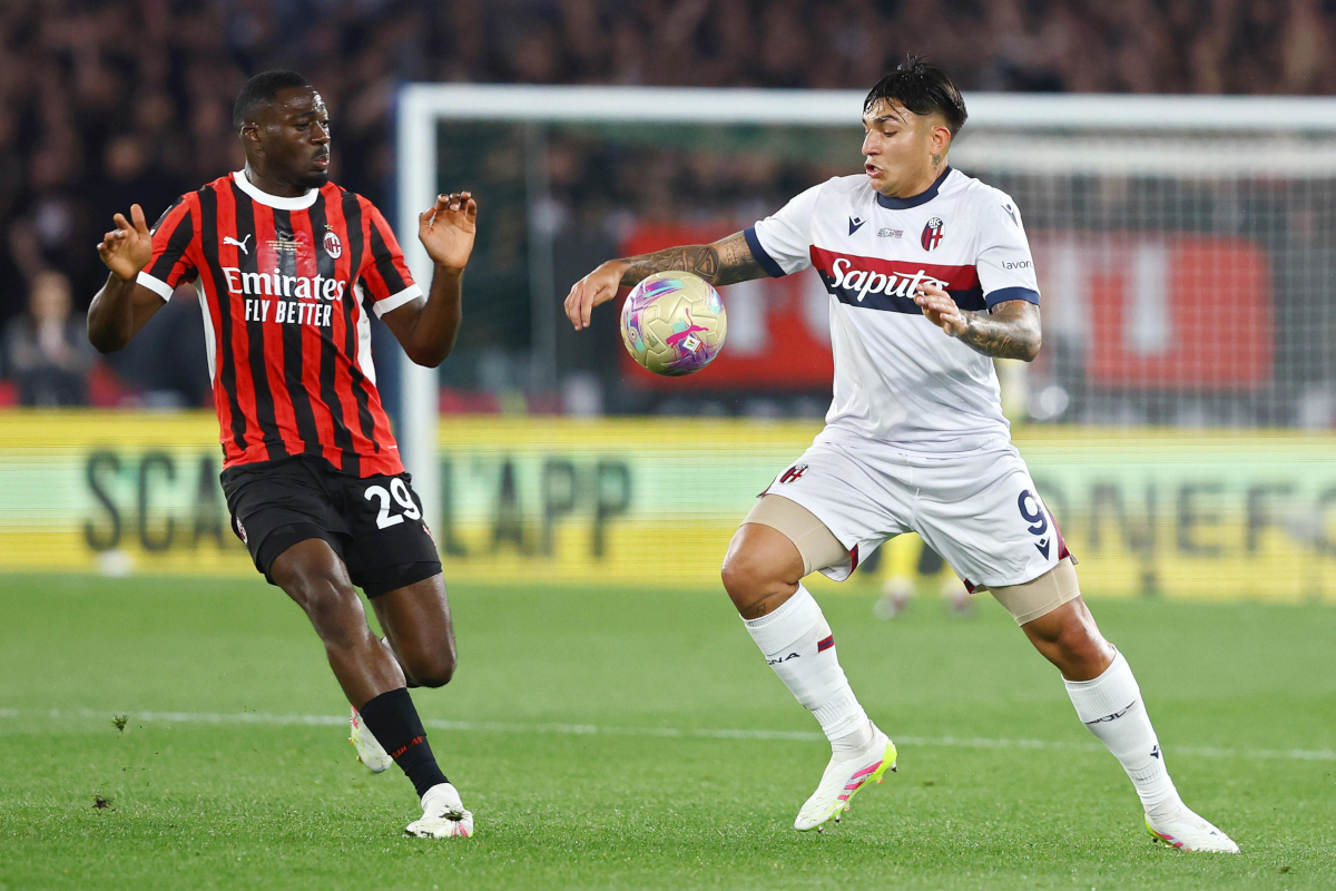 epa12100654 Youssouf Fofana of Milan (L) and Santiago Castro of Bologna in action during the Italian Cup final soccer match between AC Milan and Bologna FC in Rome, Italy, 14 May 2025. EPA-EFE/FEDERICO PROIETTI