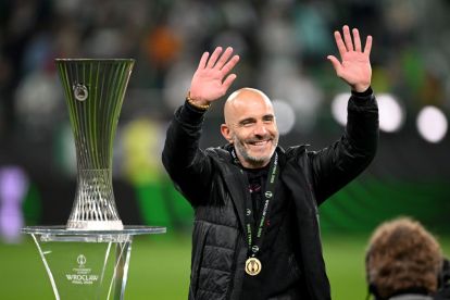 WROCLAW, POLAND - MAY 28: Enzo Maresca, Manager of Chelsea, acknowledges the fans as he walks past the UEFA Conference League trophy following his team's victory in the UEFA Conference League Final 2025 between Real Betis Balompie and Chelsea FC at Stadion Wroclaw on May 28, 2025 in Wroclaw, Poland. (Photo by Stuart Franklin/Getty Images)