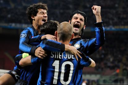 MILAN, ITALY - OCTOBER 20: Coutinho, Cristian Chivu and Wesley Sneijder of Inter Milan celebrates after the first goal during the UEFA Champions League group A match between FC Internazionale Milano and Tottenham Hotspur at Stadio Giuseppe Meazza on October 20, 2010 in Milan, Italy. (Photo by Claudio Villa/Getty Images)