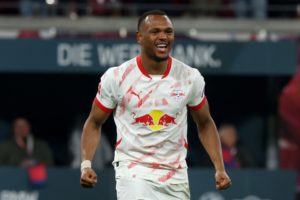 LEIPZIG, GERMANY - MARCH 15: Lois Openda of RB Leipzig celebrates scoring his team's second goal during the Bundesliga match between RB Leipzig and Borussia Dortmund at Red Bull Arena on March 15, 2025 in Leipzig, Germany. (Photo by Alexander Hassenstein/Getty Images)