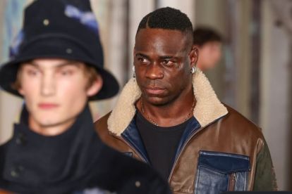Mario Balotelli acts as fashion model for KidSuper runway show.