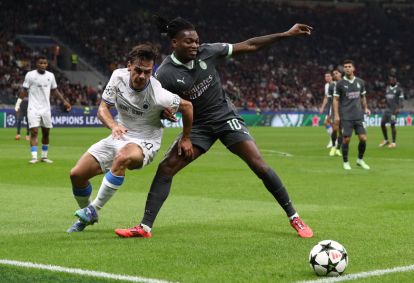 MILAN, ITALY - OCTOBER 22: Rafael Leao of AC Milan competes for the ball with Ardon Jashari of Club Brugge KV during the UEFA Champions League 2024/25 League Phase MD3 match between AC Milan and Club Brugge KV at Stadio San Siro on October 22, 2024 in Milan, Italy. (Photo by Marco Luzzani/Getty Images)