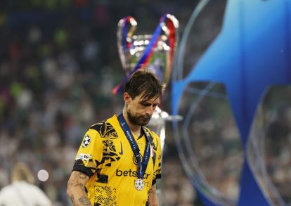 MUNICH, GERMANY - MAY 31: Francesco Acerbi of FC Internazionale looks dejected as he walks past the UEFA Champions League trophy after defeat to Paris Saint-Germain during the UEFA Champions League Final 2025 between Paris Saint-Germain and FC Internazionale Milano at Munich Football Arena on May 31, 2025 in Munich, Germany. (Photo by Carl Recine/Getty Images)