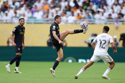MIAMI GARDENS, FLORIDA - JULY 01: Andrea Cambiaso #27 of Juventus FC controls the ball against Trent Alexander-Arnold #12 of Real Madrid C.F. during the FIFA Club World Cup 2025 round of 16 match between Real Madrid CF and Juventus FC at Hard Rock Stadium on July 01, 2025 in Miami Gardens, Florida. (Photo by Megan Briggs/Getty Images)