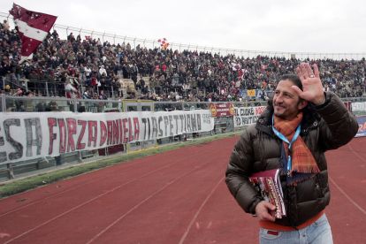 LIVORNO, ITALY - JANUARY 24: As a former player Igor Protti of AS Livorno greets fans during the Serie A match between Livorno and Napoli at Stadio Armando Picchi on January 24, 2010 in Livorno, Italy. (Photo by Gabriele Maltinti/Getty Images)