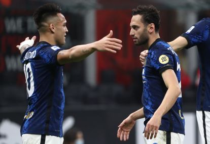 MILAN, ITALY - NOVEMBER 07: Hakan Calhanoglu (R) of FC Internazionale celebrates after scoring their team's first goal with his team-mate Lautaro Martinez (L) during the Serie A match between AC Milan and FC Internazionale at Stadio Giuseppe Meazza on November 07, 2021 in Milan, Italy. (Photo by Marco Luzzani/Getty Images)