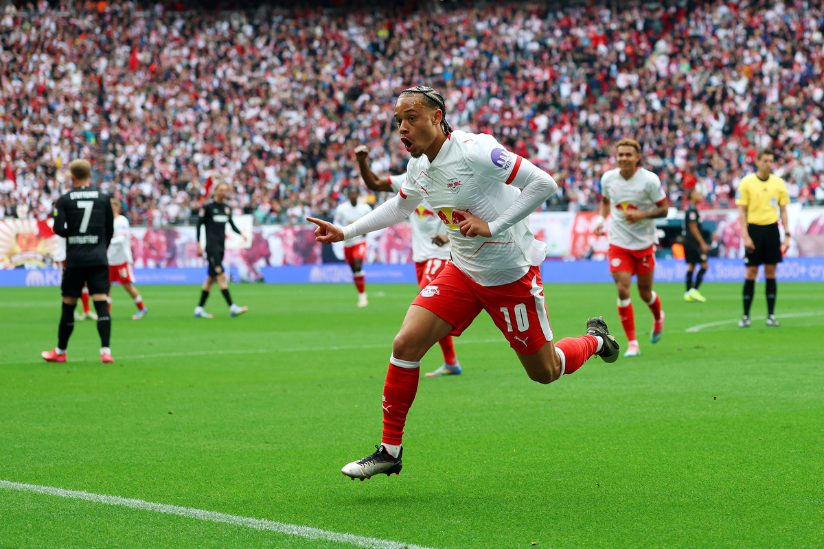 LEIPZIG, GERMANY - MAY 17: Xavi Simons of RB Leipzig celebrates scoring his team's first goal during the Bundesliga match between RB Leipzig and VfB Stuttgart at Red Bull Arena on May 17, 2025 in Leipzig, Germany. (Photo by Maja Hitij/Getty Images)