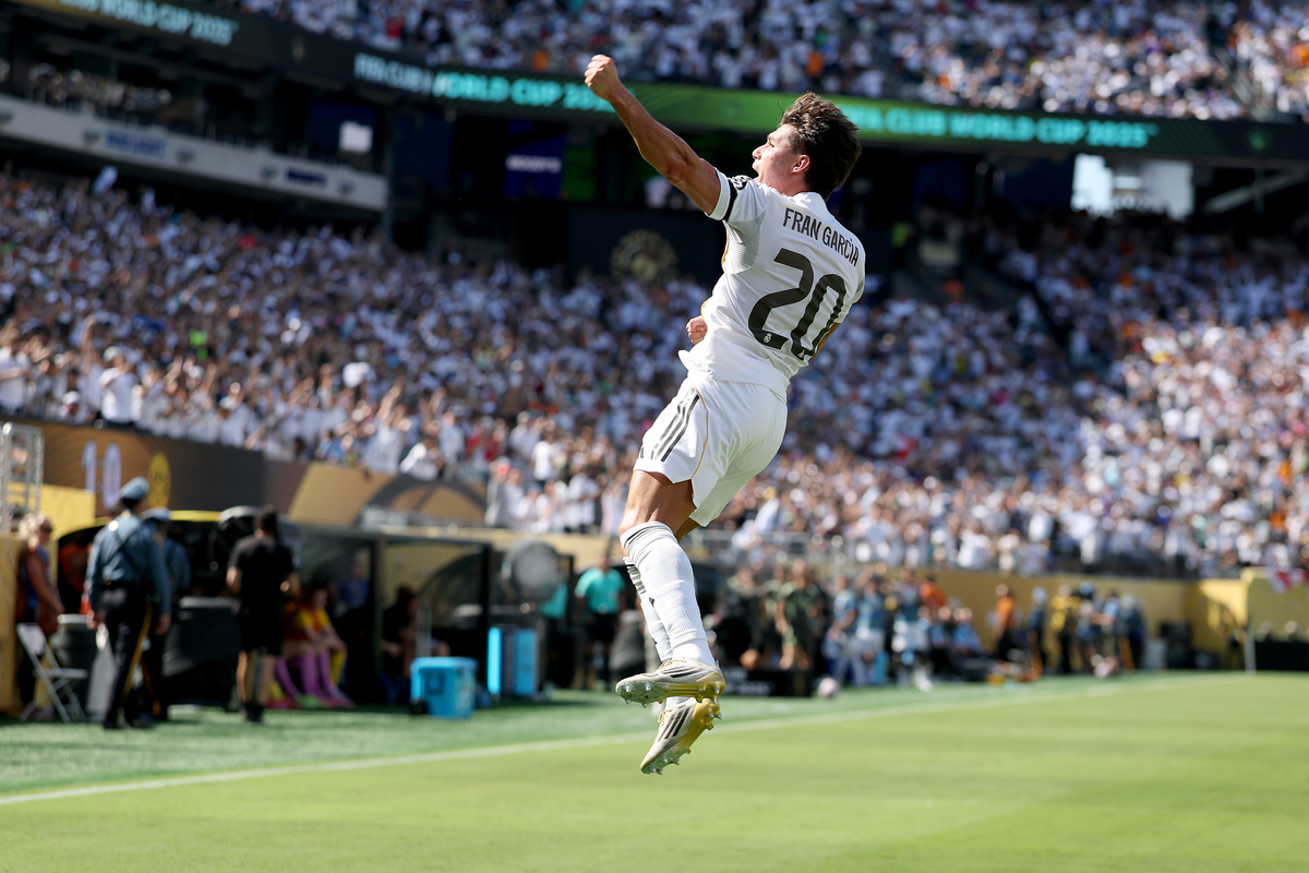 EAST RUTHERFORD, NEW JERSEY - JULY 05: Fran Garcia #20 of Real Madrid C. F. celebrates scoring his team's second goal during the FIFA Club World Cup 2025 quarter-final match between Real Madrid CF and Borussia Dortmund at MetLife Stadium on July 05, 2025 in East Rutherford, New Jersey. (Photo by Francois Nel/Getty Images)