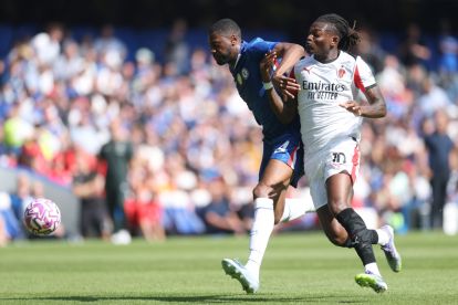 LONDON, ENGLAND - AUGUST 10: Tosin Adarabioyo of Chelsea is put under pressure by Rafael Leao of AC Milan during the pre-season friendly match between Chelsea and AC Milan at Stamford Bridge on August 10, 2025 in London, England. (Photo by Richard Pelham/Getty Images)