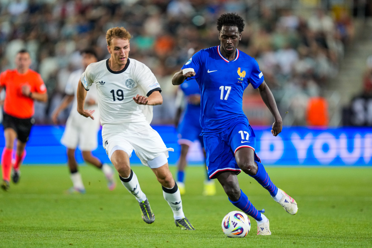 KOSICE, SLOVAKIA - JUNE 25: Nelson Weiper of U21 Germany in action against Soungoutou Magassa of U21 France during the UEFA European Under-21 Championship 2025 Semi-Final match between Germany and France at Kosice Football Arena on June 25, 2025 in Kosice, Slovakia. (Photo by Christian Hofer/Getty Images)
