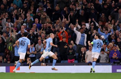 MANCHESTER, ENGLAND - SEPTEMBER 18: Erling Haaland of Manchester City celebrates scoring his team's first goal during the UEFA Champions League 2025/26 League Phase MD1 match between Manchester City and SSC Napoli at City of Manchester Stadium on September 18, 2025 in Manchester, England. (Photo by Ryan Pierse/Getty Images)