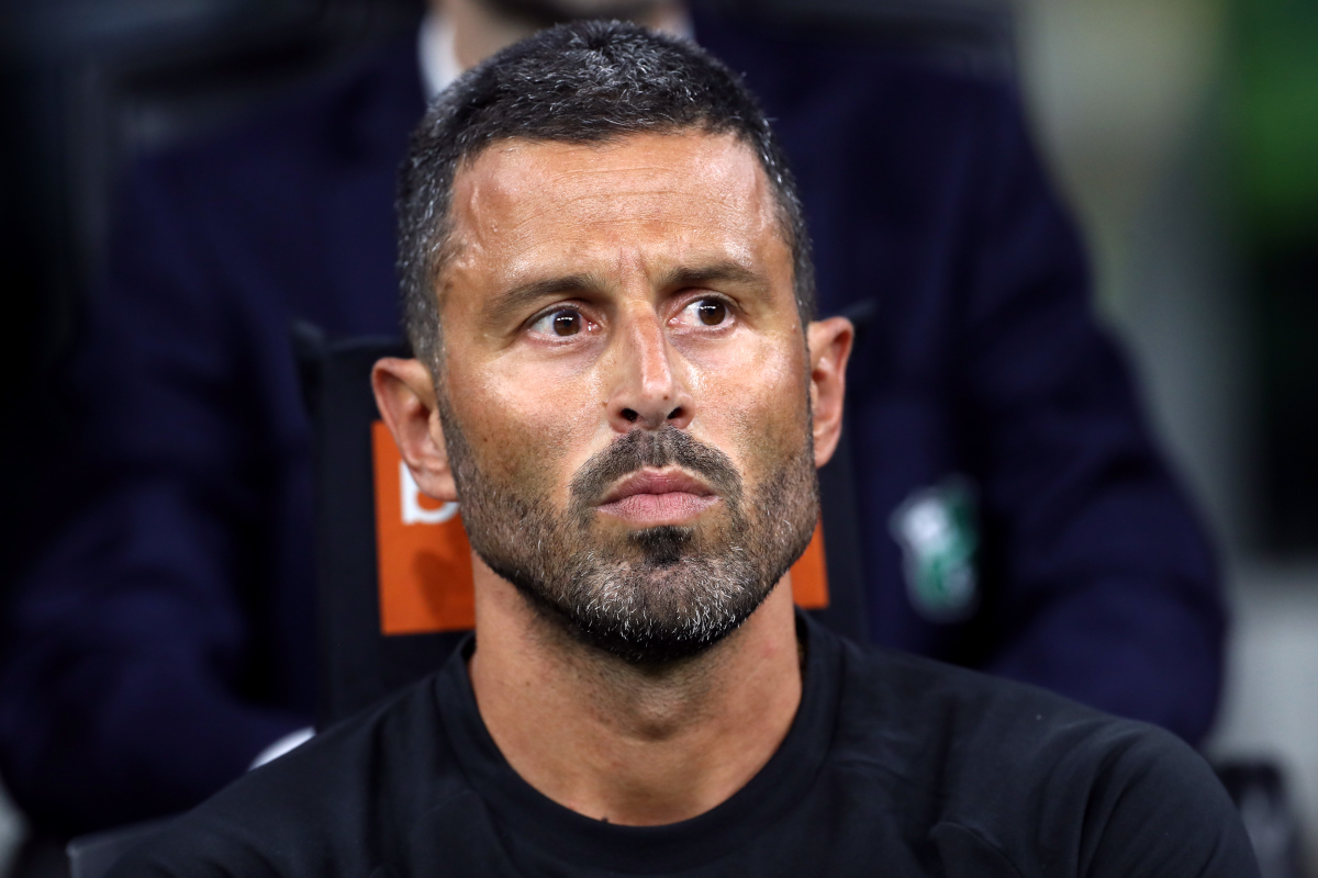 MILAN, ITALY - SEPTEMBER 21: Fabio Grosso, Head Coach of Sassuolo, looks on prior to the Serie A match between FC Internazionale and US Sassuolo Calcio at Giuseppe Meazza Stadium on September 21, 2025 in Milan, Italy. (Photo by Marco Luzzani/Getty Images)