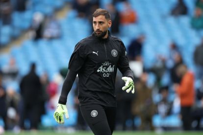 MANCHESTER, ENGLAND - SEPTEMBER 14: Gianluigi Donnarumma of Manchester City warms up prior to the Premier League match between Manchester City and Manchester United at Etihad Stadium on September 14, 2025 in Manchester, England. (Photo by Michael Regan/Getty Images)
