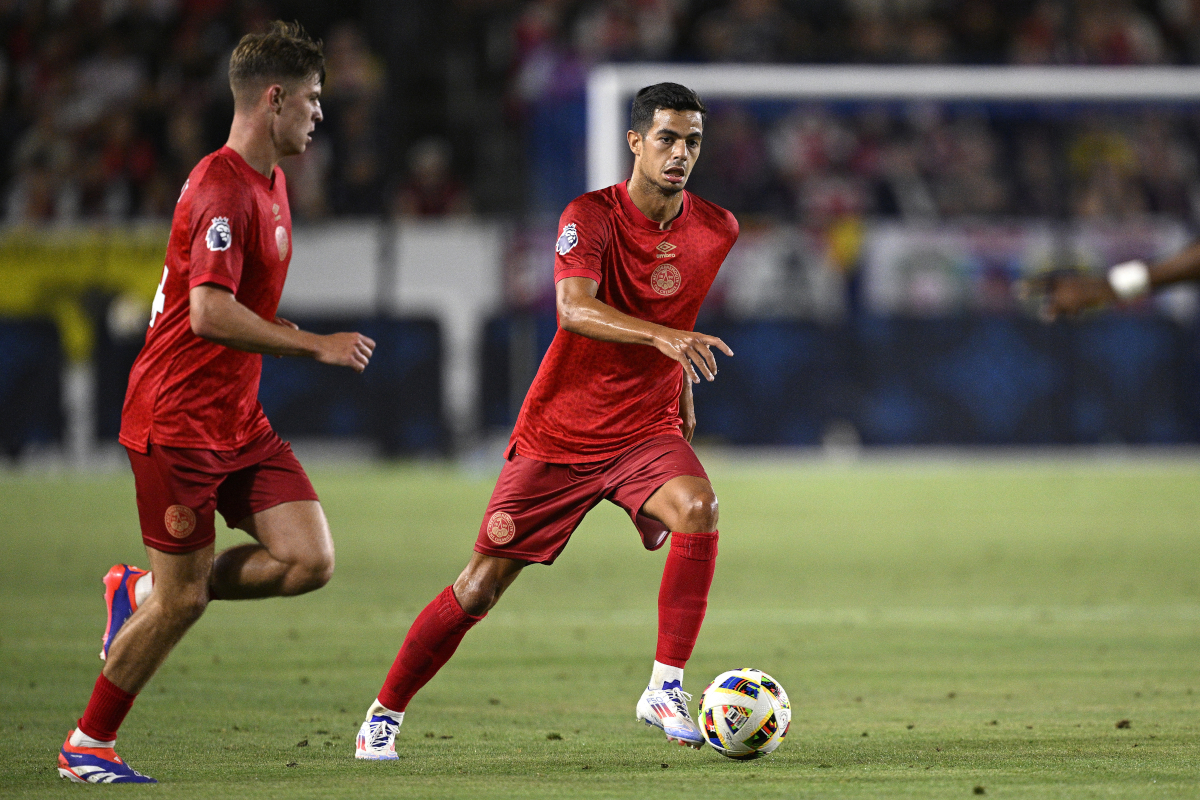 CARSON, CALIFORNIA - JULY 24: Romain Faivre #8 of AFC Bournemouth controls the ball against Arsenal FC during a pre-season friendly match between Arsenal FC and AFC Bournemouth at Dignity Health Sports Park on July 24, 2024 in Carson, California. (Photo by Orlando Ramirez/Getty Images)