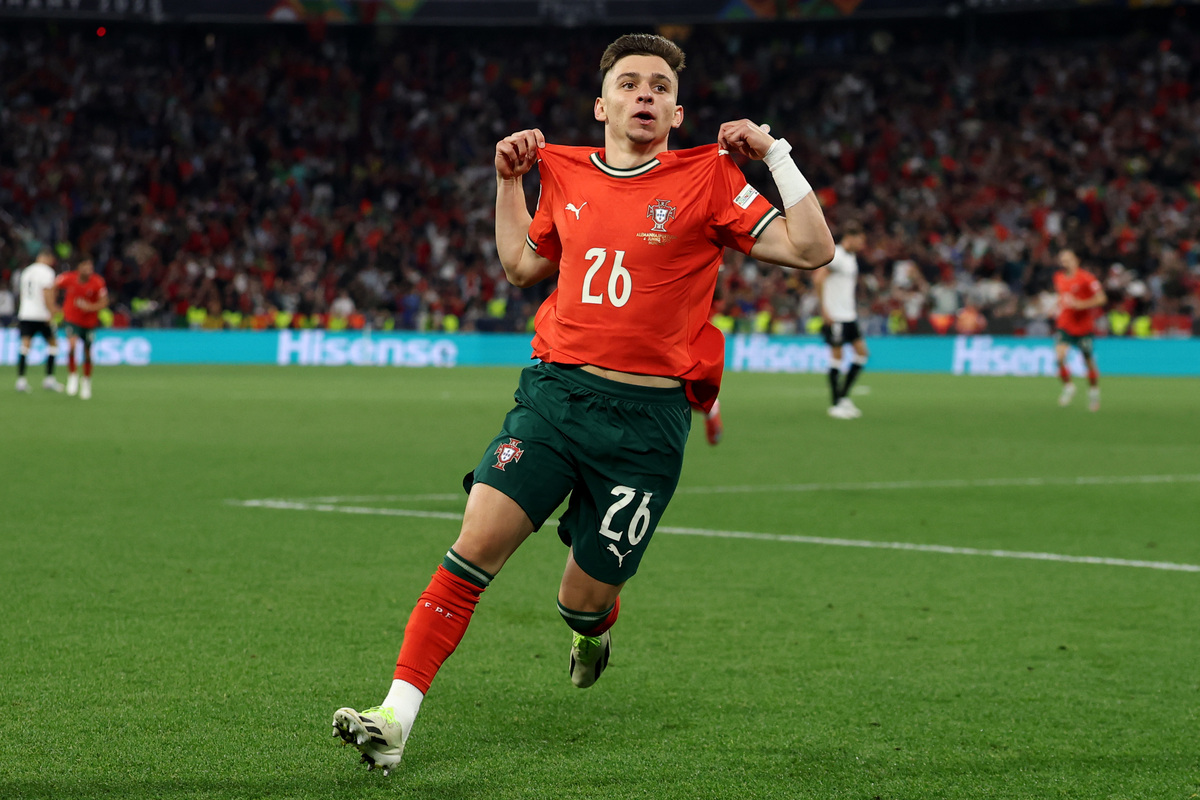 MUNICH, GERMANY - JUNE 04: Francisco Conceicao of Portugal celebrates scoring his team's first goal during the UEFA Nations League 2025 semifinal match between Germany and Portugal at Munich Football Arena on June 04, 2025 in Munich, Germany. (Photo by Lars Baron/Getty Images)