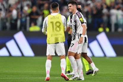 TURIN, ITALY - SEPTEMBER 13: Vasilije Adzic of Juventus interacts with teammate Filip Kostic after the team's victory in the Serie A match between Juventus FC and FC Internazionale at Allianz Stadium on September 13, 2025 in Turin, Italy. (Photo by Valerio Pennicino/Getty Images)