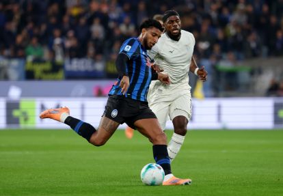 BERGAMO, ITALY - OCTOBER 19: Ederson of Atalanta BC passes the ball under pressure from Nuno Tavares of Lazio during the Serie A match between Atalanta BC and SS Lazio at Gewiss Stadium on October 19, 2025 in Bergamo, Italy. (Photo by Francesco Scaccianoce/Getty Images)