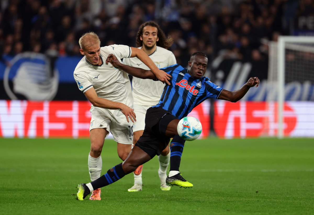 BERGAMO, ITALY - OCTOBER 19: Kamaldeen Sulemana of Atalanta BC is challenged by Gustav Isaksen of Lazio during the Serie A match between Atalanta BC and SS Lazio at Gewiss Stadium on October 19, 2025 in Bergamo, Italy. (Photo by Francesco Scaccianoce/Getty Images)