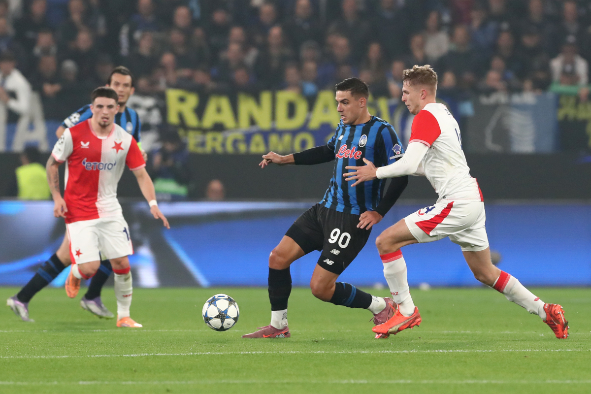 BERGAMO, ITALY - OCTOBER 22: Nikola Krstovic of Atalanta BC is challenged by David Zima of Slavia Praha during the UEFA Champions League 2025/26 League Phase MD3 match between Atalanta BC and SK Slavia Praha at Stadio di Bergamo on October 22, 2025 in Bergamo, Italy. (Photo by Marco Luzzani/Getty Images)