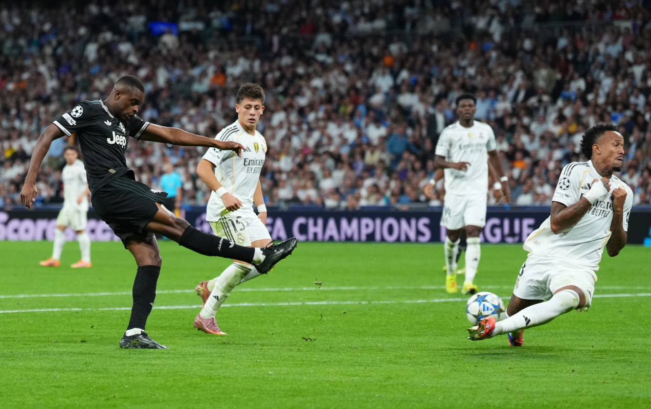 MADRID, SPAIN - OCTOBER 22: Eder Militao of Real Madrid blocks a shot from Pierre Kalulu of Juventus during the UEFA Champions League 2025/26 League Phase MD3 match between Real Madrid C.F. and Juventus at Estadio Santiago Bernabeu on October 22, 2025 in Madrid, Spain. (Photo by Angel Martinez/Getty Images)