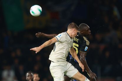 PISA, ITALY - OCTOBER 30: Toma Basic of SS Lazio in action against Idrissa Toure' of Pisa Sporting Club during the Serie A match between Pisa SC and SS Lazio at Arena Garibaldi on October 30, 2025 in Pisa, Italy. (Photo by Gabriele Maltinti/Getty Images)