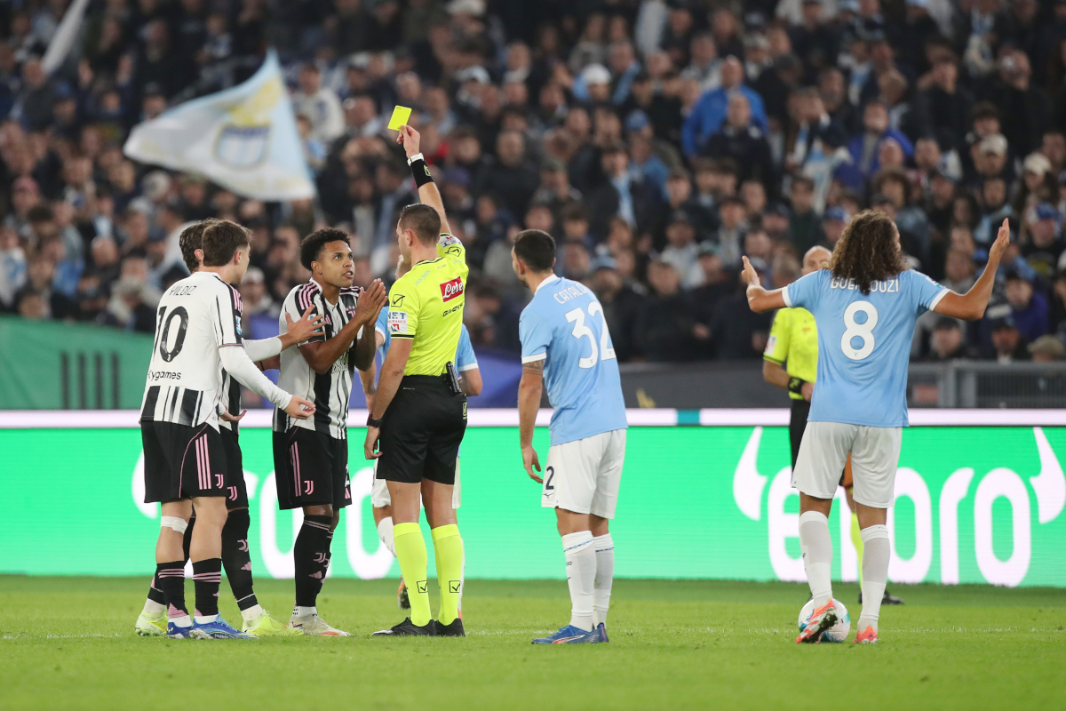 ROME, ITALY - OCTOBER 26: Weston McKennie of Juventus is shown a yellow card by referee Andrea Colombo during the Serie A match between SS Lazio and Juventus FC at Stadio Olimpico on October 26, 2025 in Rome, Italy. (Photo by Paolo Bruno/Getty Images)