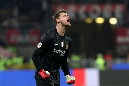 MILAN, ITALY - APRIL 02: Josep Martinez of FC Internazionale celebrates after his teammate Hakan Calhanoglu scored his side's first goal during the Coppa Italia Semi Final match between AC Milan and FC Internazionale at Stadio Giuseppe Meazza on April 02, 2025 in Milan, Italy. (Photo by Marco Luzzani/Getty Images)