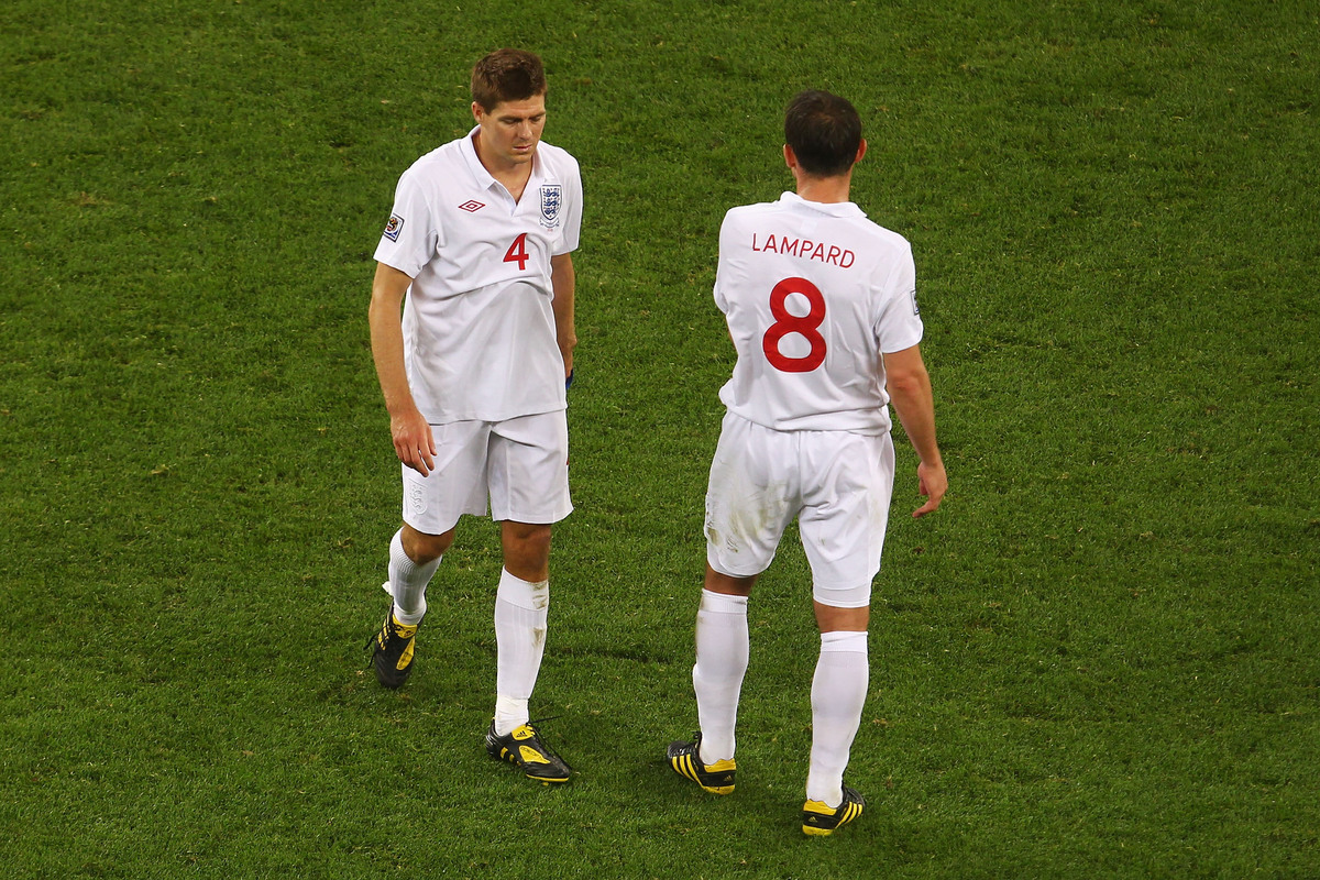 CAPE TOWN, SOUTH AFRICA - JUNE 18: Captain Steven Gerrard and Frank Lampard of England look dejected during the 2010 FIFA World Cup South Africa Group C match between England and Algeria at Green Point Stadium on June 18, 2010 in Cape Town, South Africa. (Photo by Lars Baron/Getty Images)