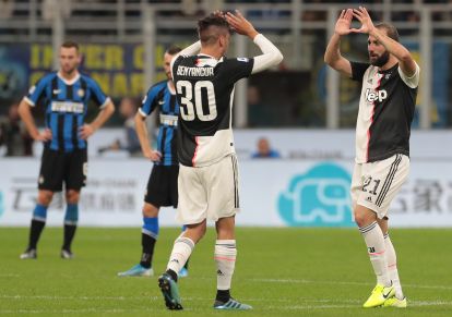 MILAN, ITALY - OCTOBER 06: Gonzalo Higuain of Juventus celebrates his goal with his team-mate Rodrigo Bentancur during the Serie A match between FC Internazionale and Juventus at Stadio Giuseppe Meazza on October 6, 2019 in Milan, Italy. (Photo by Emilio Andreoli/Getty Images)