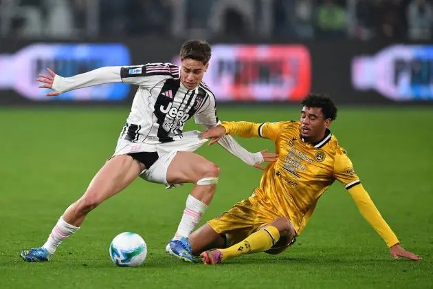 TURIN, ITALY - OCTOBER 29: Kenan Yildiz of Juventus FC is tackled by Arthur Atta of Udinese Calcio during the Serie A match between Juventus FC and Udinese Calcio at on October 29, 2025 in Turin, Italy. (Photo by Valerio Pennicino/Getty Images)